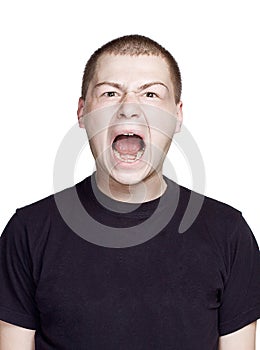 Portrait of young man. Facial expression. Scream face