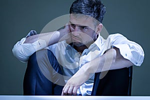 Portrait of young man feeling unhappy