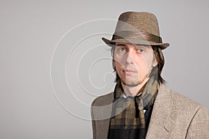 Portrait of a young man in hat