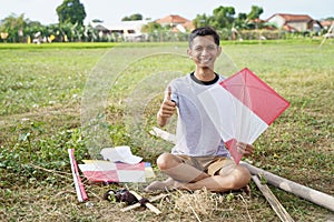 Portrait young man hold the kite