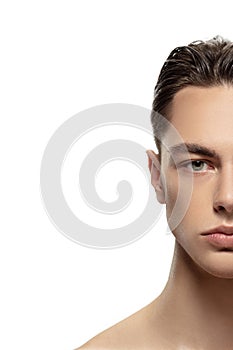 Portrait of young man isolated on white studio background. Caucasian attractive male model. Concept of fashion and