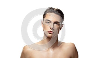 Portrait of young man isolated on white studio background. Caucasian attractive male model. Concept of fashion and