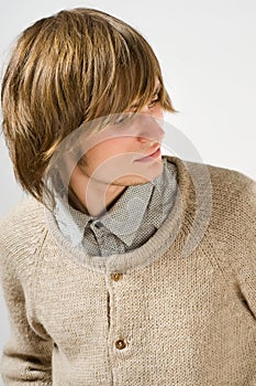 Portrait of young man on light grey background