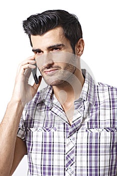 Portrait of young man on mobilephone