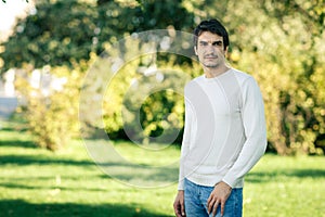 Portrait of young man outdoors