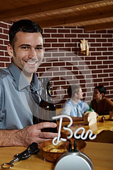 Portrait of young man in pub