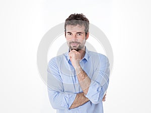 Portrait of young man resting chin