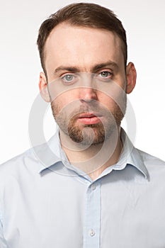 Portrait of a young man with a serious expression