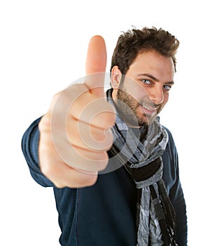 Portrait of a young man showing okay gesture