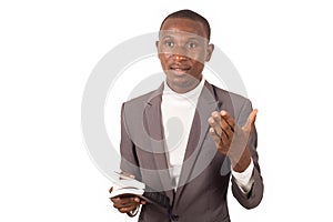 Portrait of young man in a suit standing