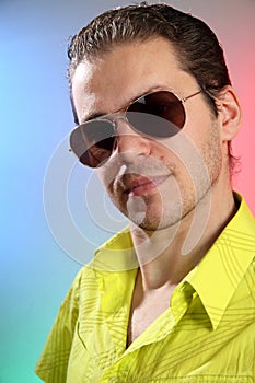 Portrait of a young man with sun glasses