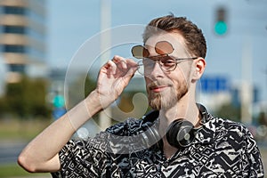 Portrait of a young man in sunglasses