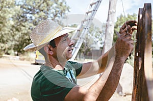 Portrait of young man working outdoors