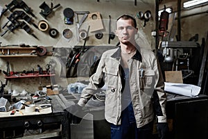 Portrait Of Young Man In Workshop