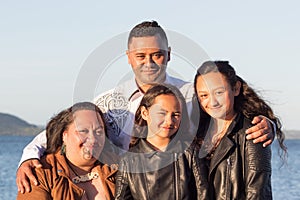 Portrait of a young Maori family