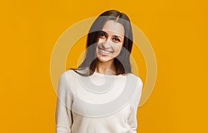 Portrait of young middle eastern girl smiling and looking at camera