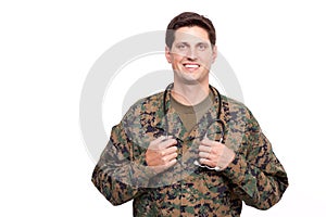 Portrait of a young military doctor with stethoscope