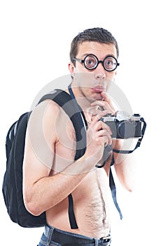 Portrait of a young nerd with old fashioned camera