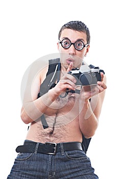 Portrait of a young nerd with old fashioned camera