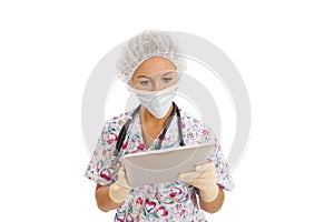 Portrait of young nurse using computer