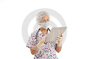Portrait of young nurse using computer
