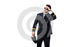 portrait of young pilot in sunglasses looking away