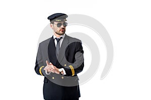 portrait of young pilot in sunglasses looking away