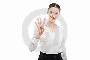 Young pretty bussines woman showing number four with fingers photo