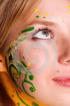 Portrait of young pretty woman with body painting