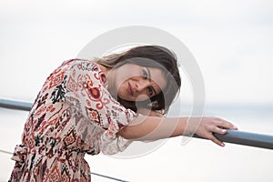 Portrait of a young pretty woman in casual summer clothing smiling. Happy, happiness