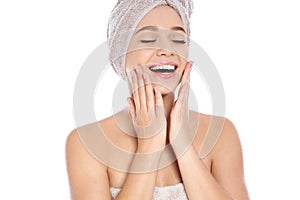 Portrait of young pretty woman with towels