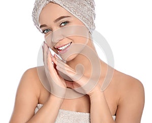 Portrait of young pretty woman with towels