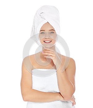 Portrait of young pretty woman with towels