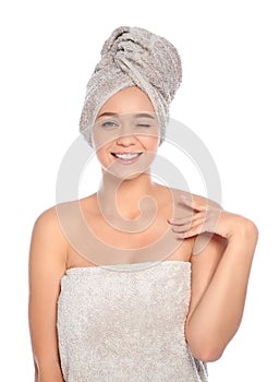 Portrait of young pretty woman with towels