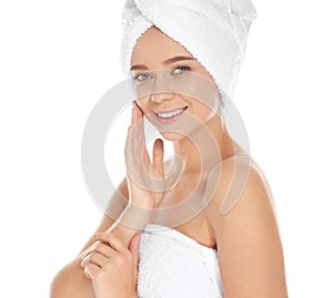 Portrait of young pretty woman with towels