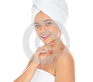 Portrait of young pretty woman with towels