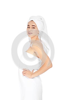 Portrait of young pretty woman with towels