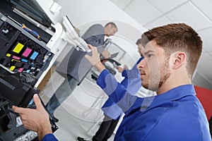 portrait young printer technician