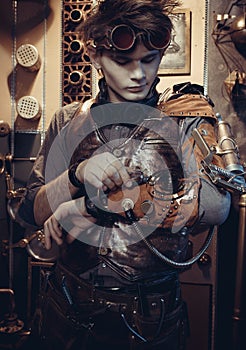 Portrait of a young scientist in the steampunk style.