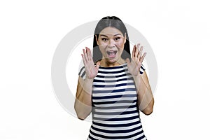 Portrait of a young screaming yelling asian woman.