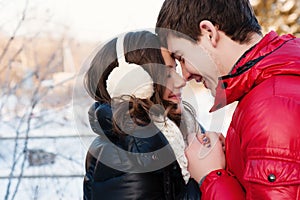 Portrait of young sensual couple in cold winter wather.