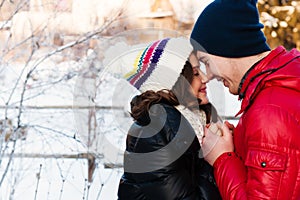 Portrait of young sensual couple in cold winter wather.