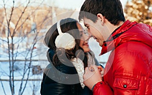 Portrait of young sensual couple in cold winter wather.