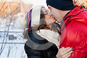 Portrait of young sensual couple in cold winter wather.