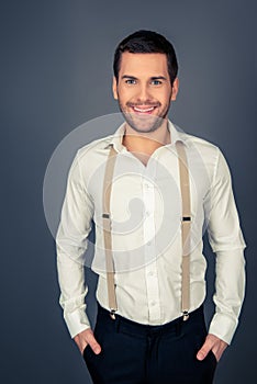 Portrait of a young sexy man with beaming smile photo