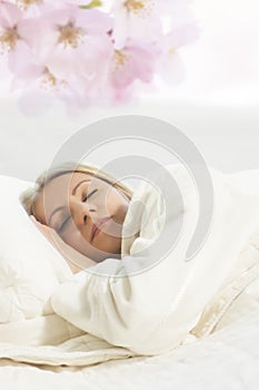Portrait of young sleeping blond woman