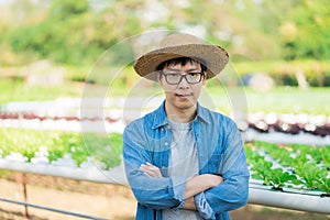 Portrait of young smart farmer using digital tablet computer for inspecting. using technology in agriculture field application in