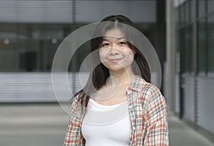 Portrait of a young smiling Chinese girl