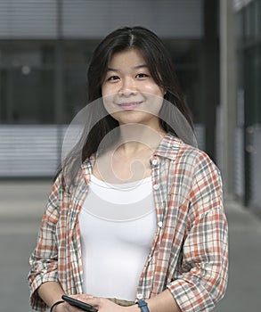 Portrait of a young smiling Chinese girl