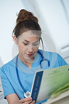 Portrait of young and smiling female doctor